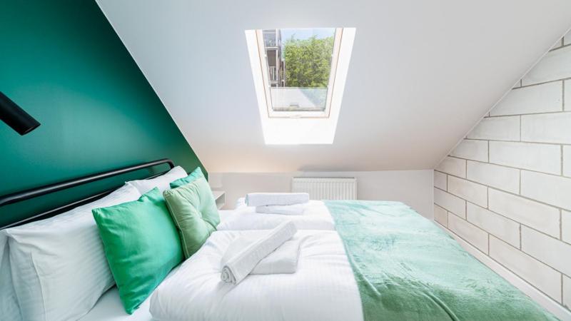 Posteľ alebo postele v izbe v ubytovaní Apartament Dwa Pięterka w Szklarskiej