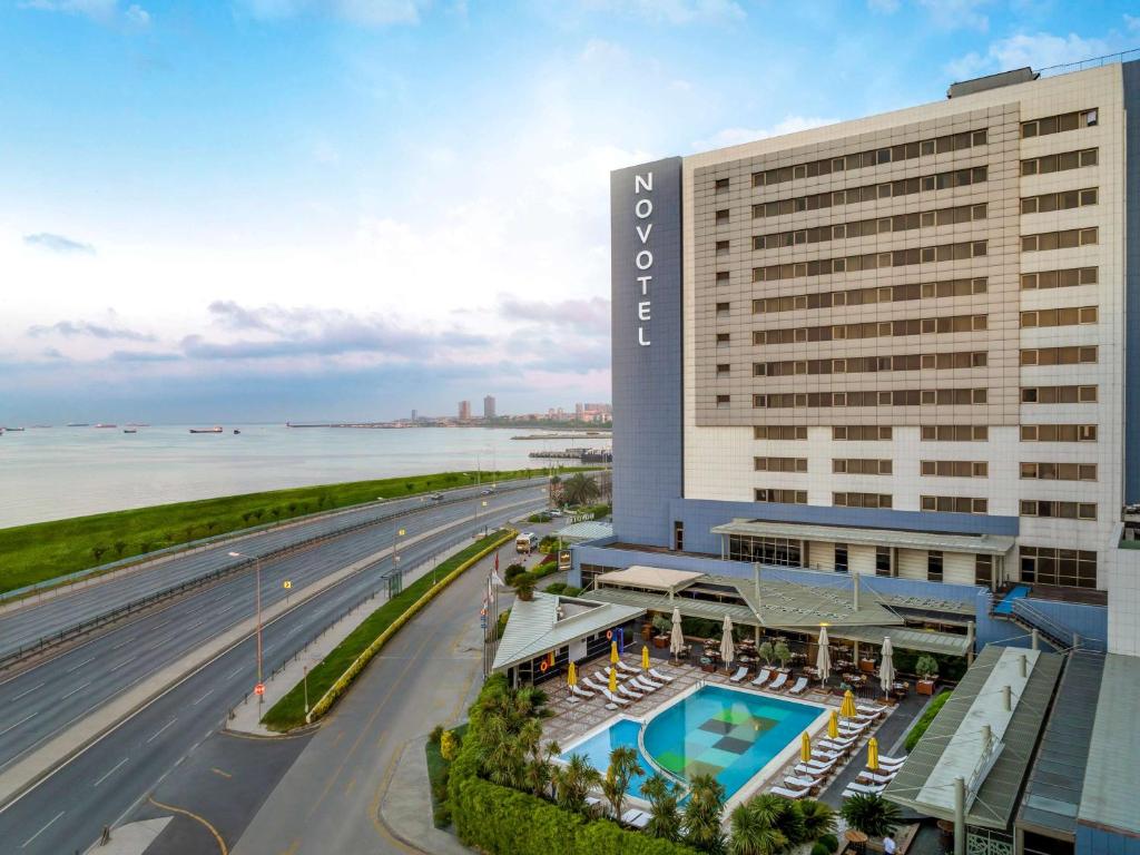 an aerial view of the omni hotel with a pool at Novotel Istanbul Zeytinburnu in Istanbul