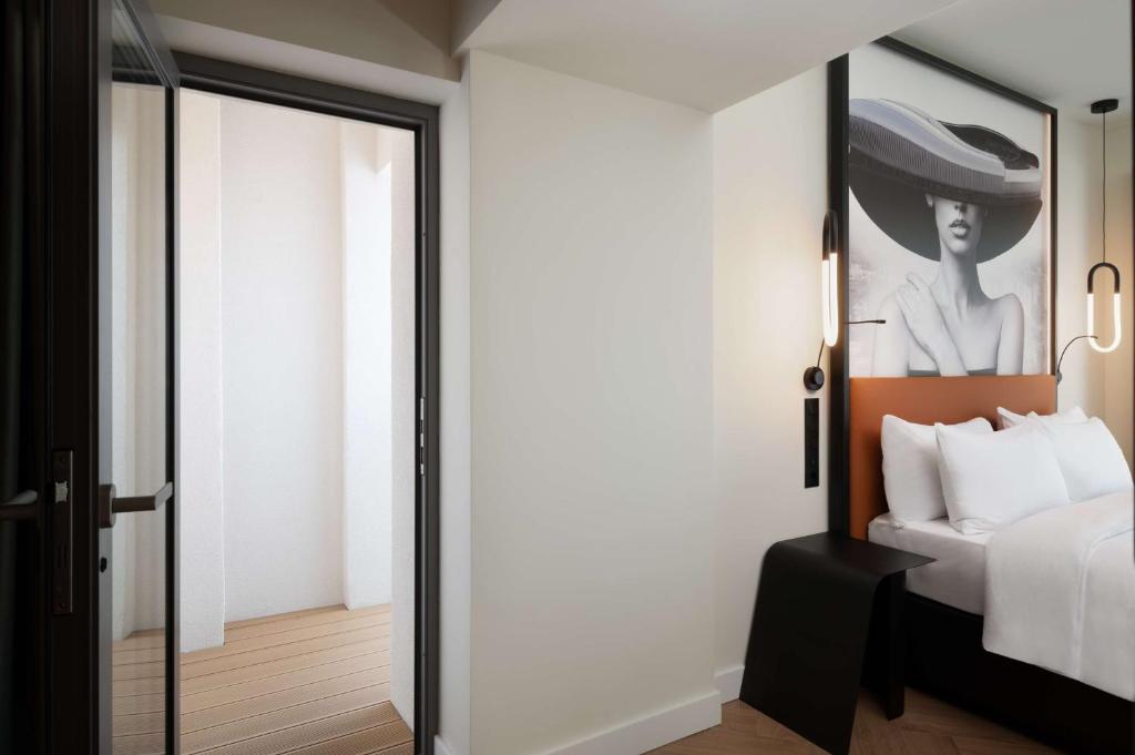 Postel nebo postele na pokoji v ubytování Radisson Blu Hotel, Cluj