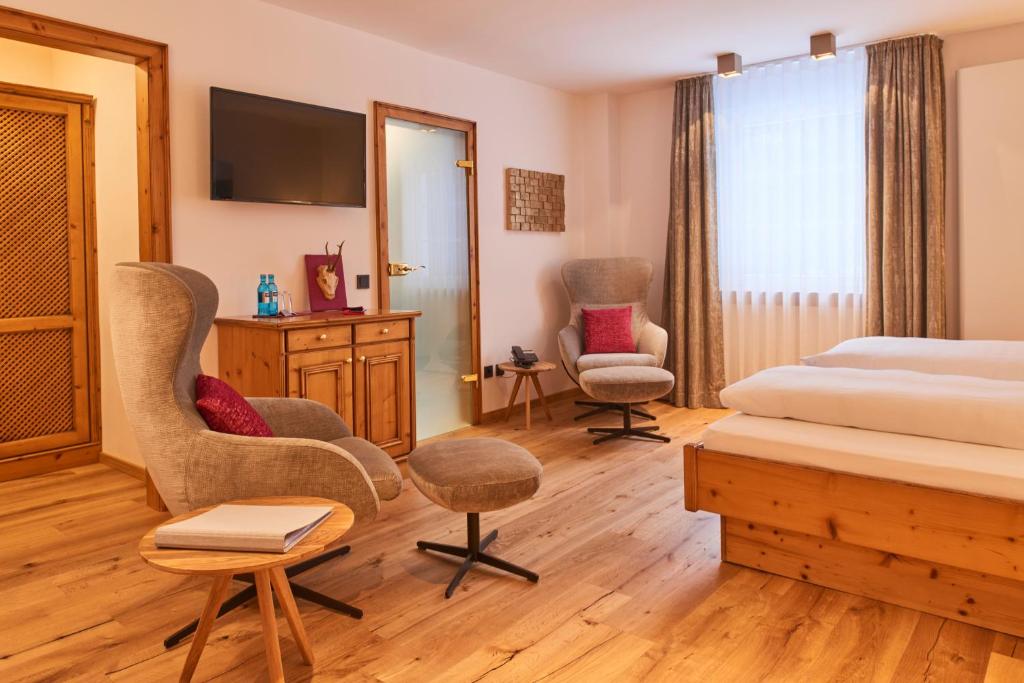 Postel nebo postele na pokoji v ubytování Hotel Waldhaus Föckinghausen