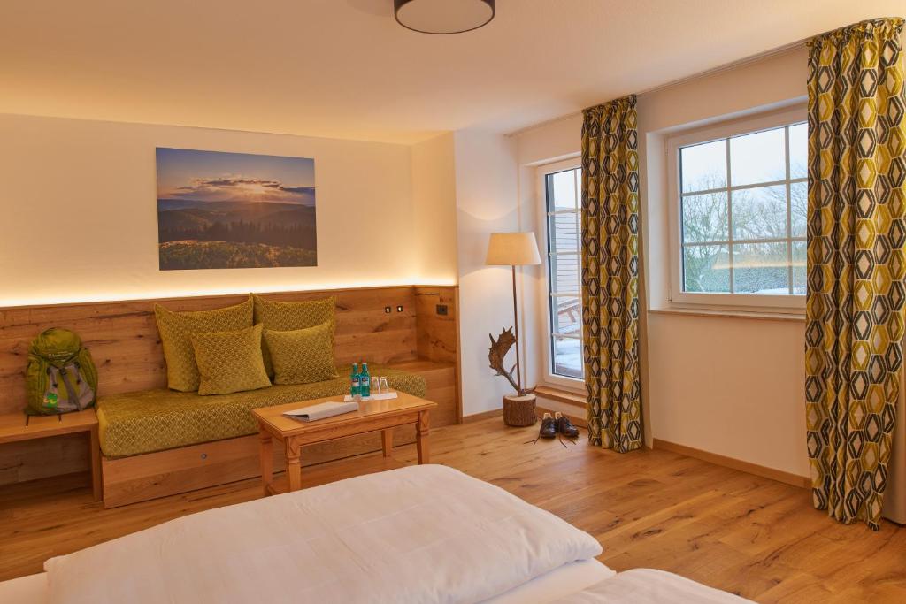 Posezení v ubytování Hotel Waldhaus Föckinghausen