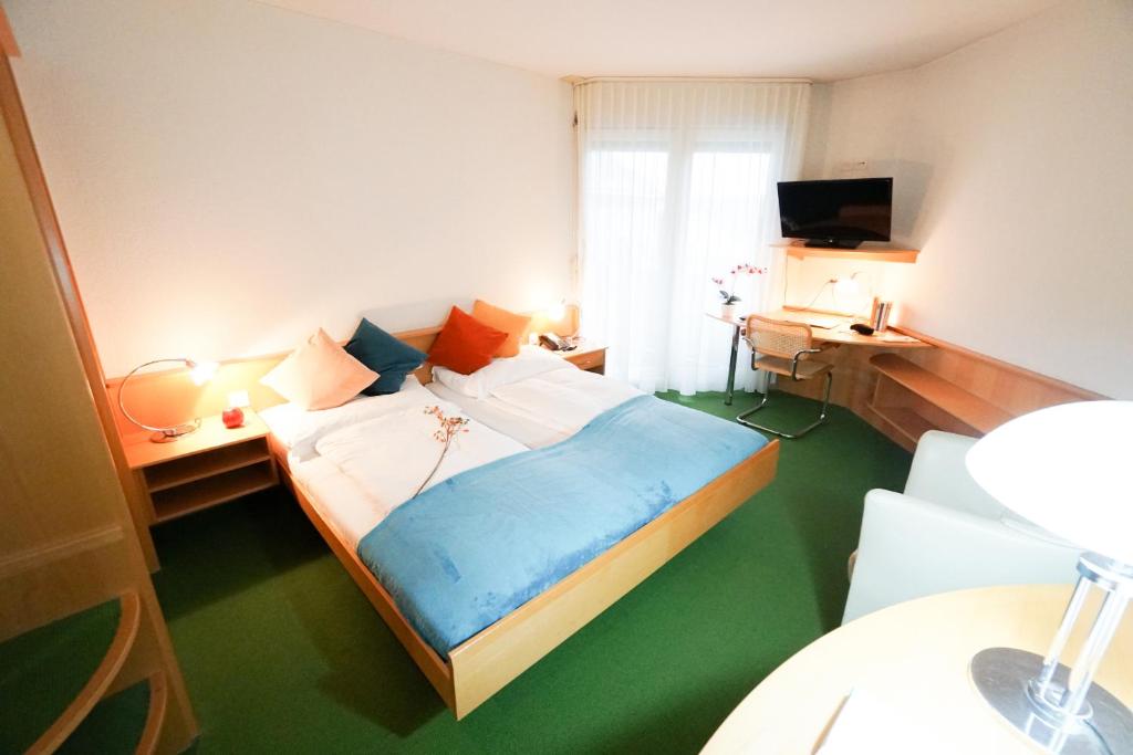 Cama o camas de una habitación en Centra Hotel Zurich