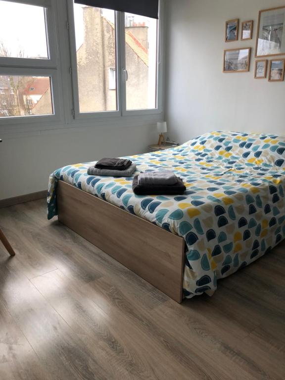 Un pat sau paturi într-o cameră la Studio - Parking privé - Wifi - proche Nausicaa et plage