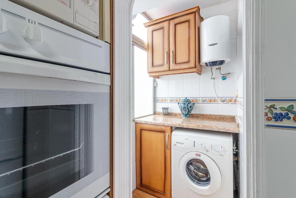 A kitchen or kitchenette at Flatguest Carvajal