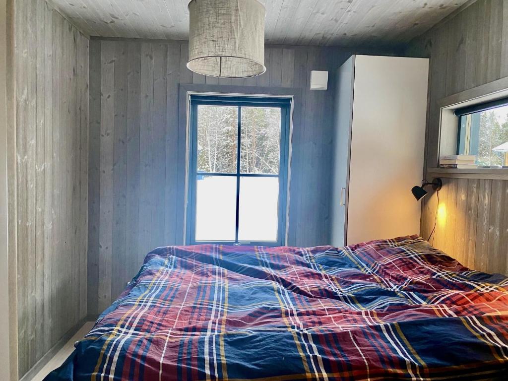 Postel nebo postele na pokoji v ubytování Kåvanstugan Funäsdalen