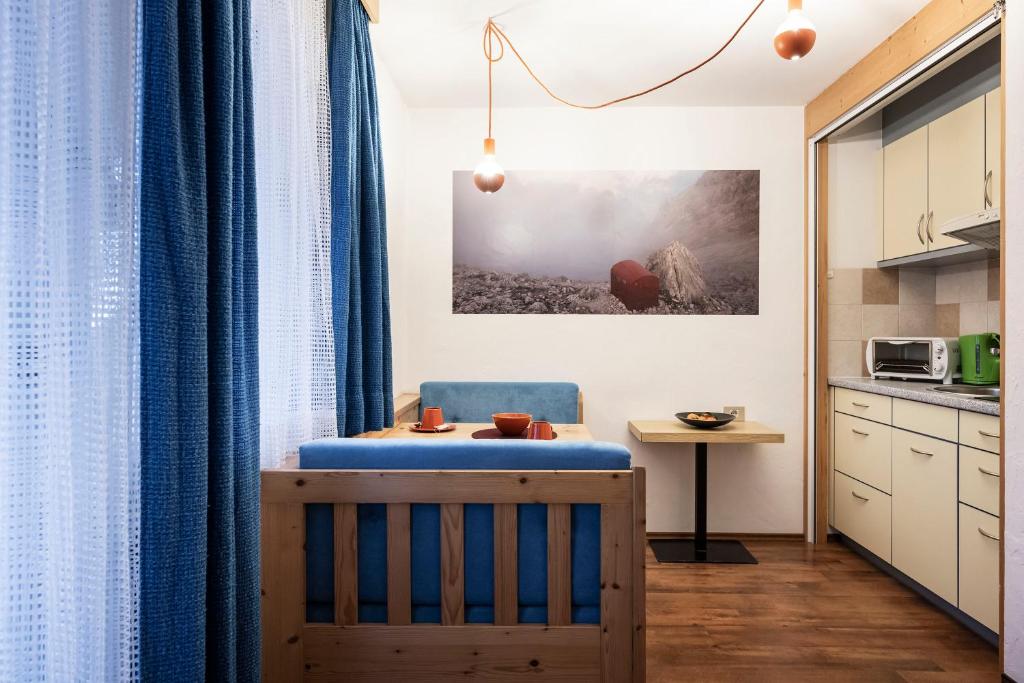 Kuchyň nebo kuchyňský kout v ubytování Garni Reider