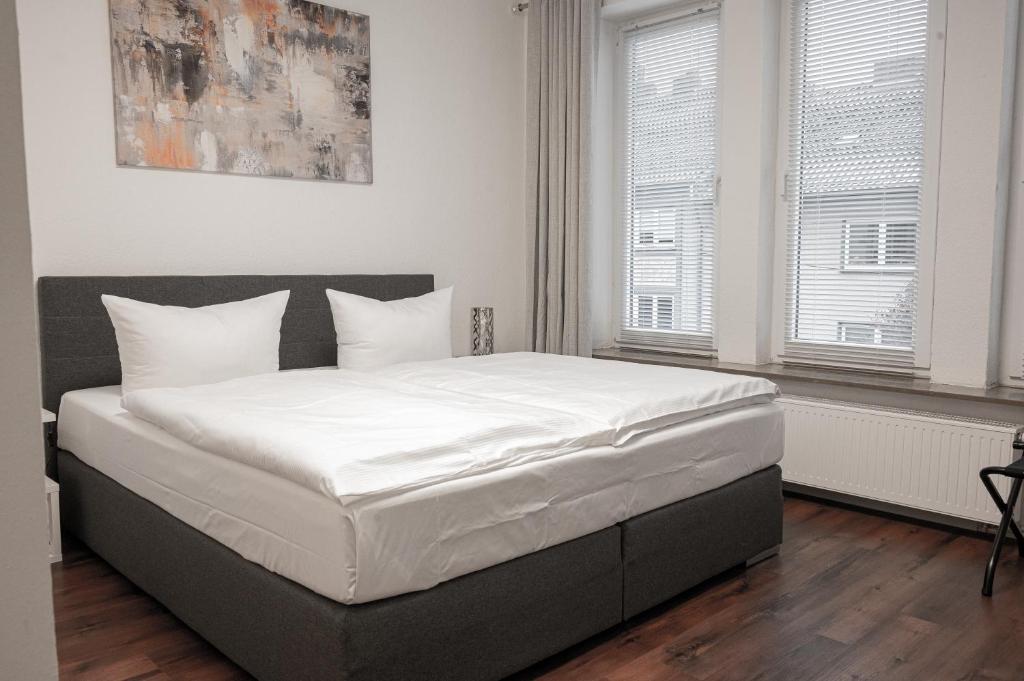 Postel nebo postele na pokoji v ubytování Hotel Teatro
