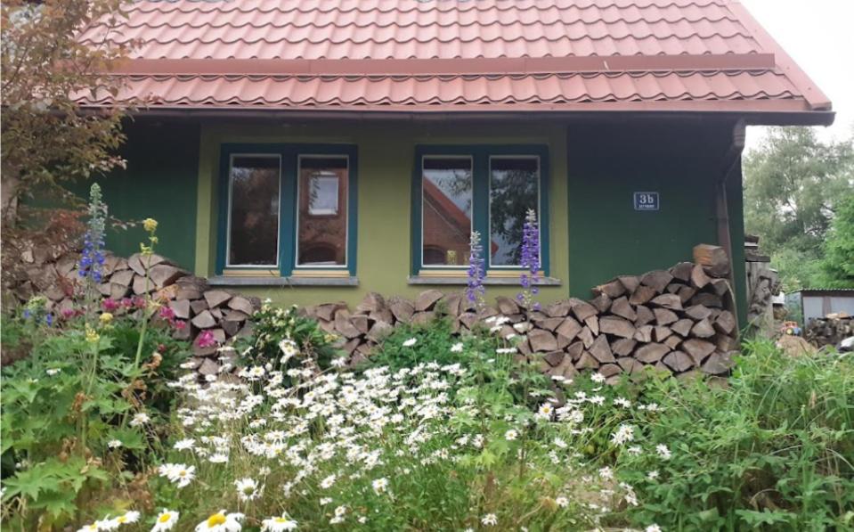 Vonkajšia záhrada v ubytovaní Zielony Domek w Sztynorcie