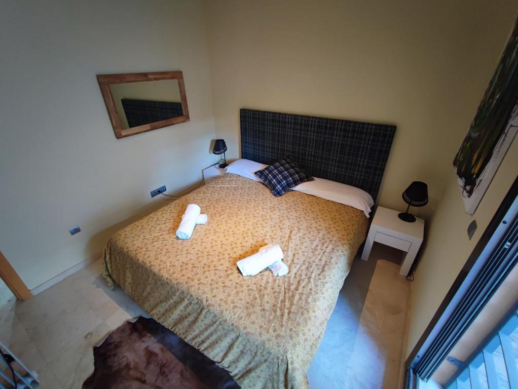 Posteľ alebo postele v izbe v ubytovaní Villa Aguilas Club Guest house