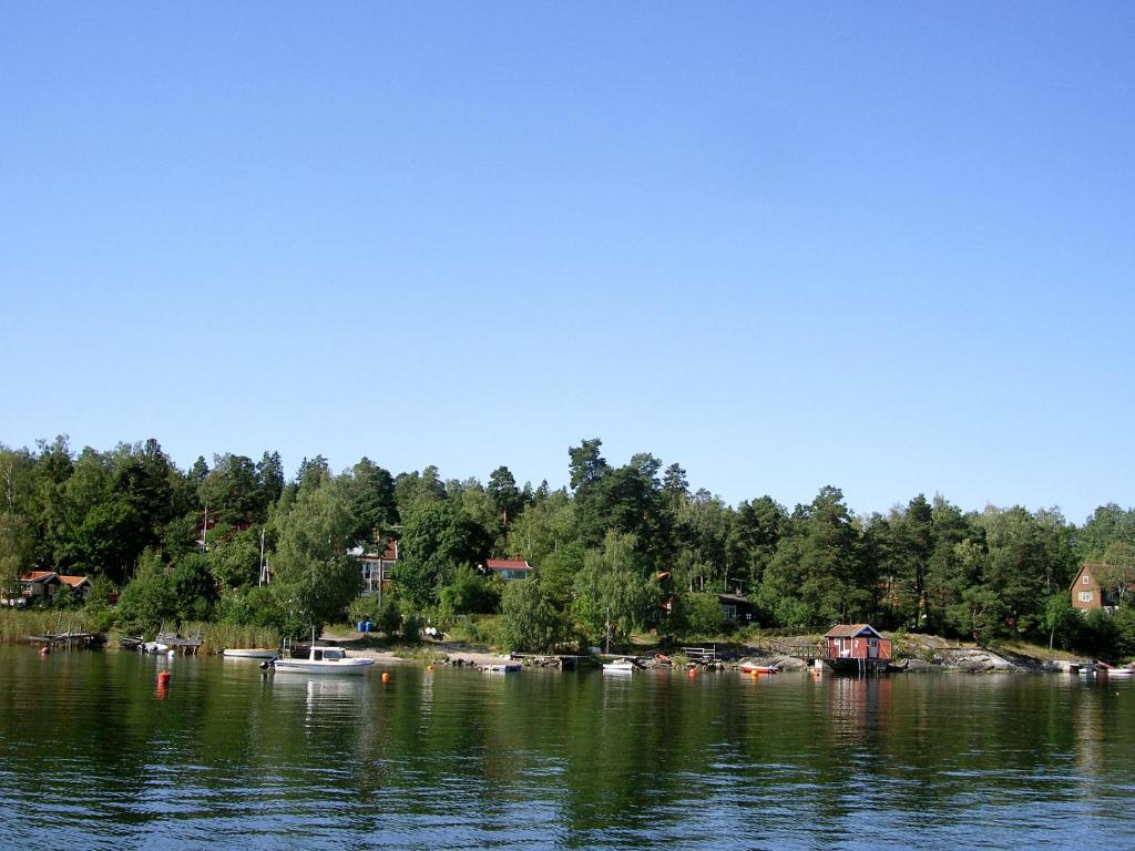 a large body of water with boats in it at Nice summer house near the sea on Lidingo in Lidingö