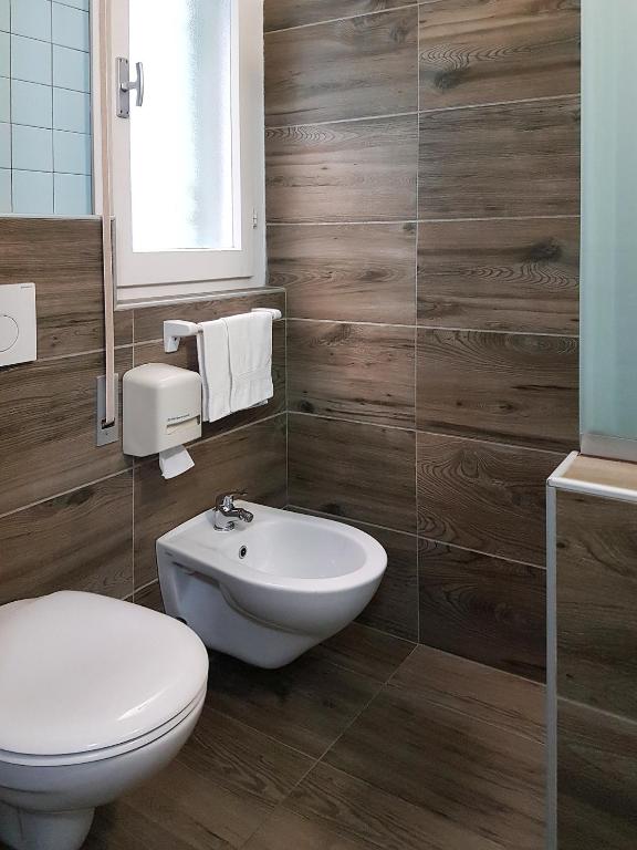 Koupelna v ubytování Hotel Sorriso - molto più di una stella