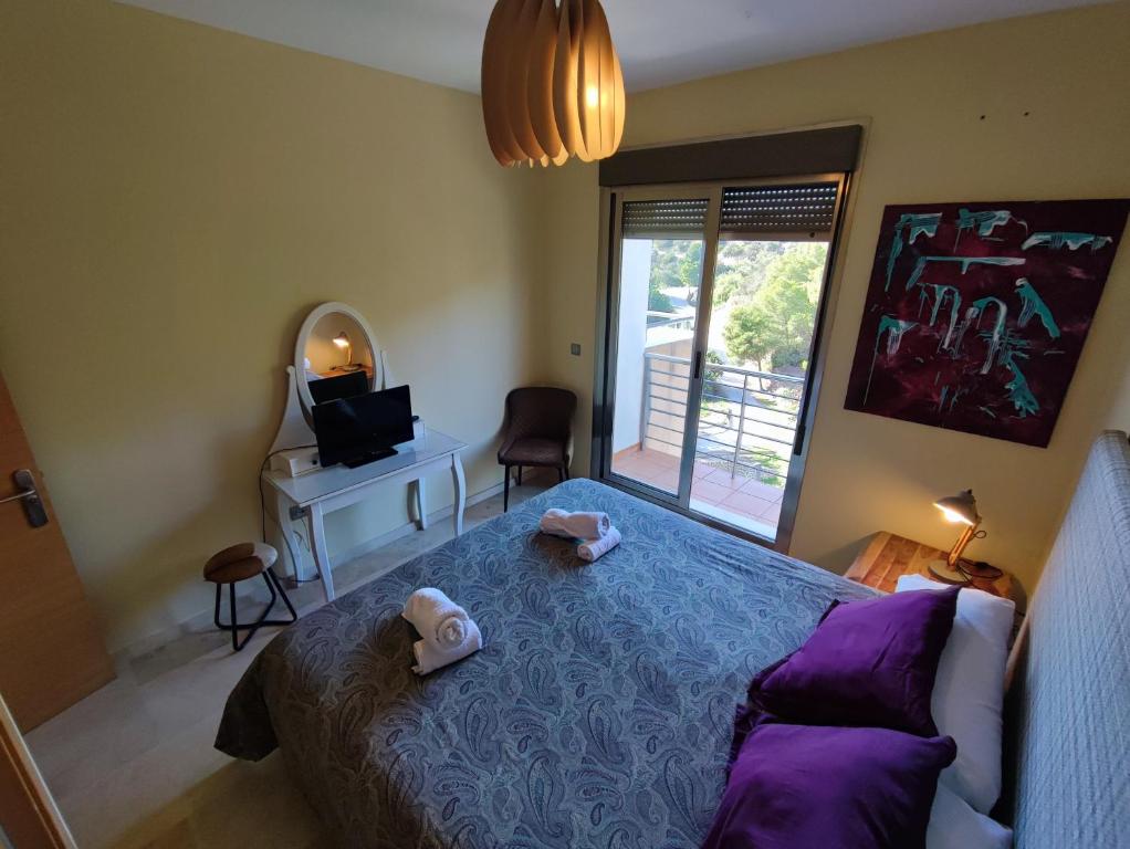 Posteľ alebo postele v izbe v ubytovaní Villa Aguilas Club Guest house