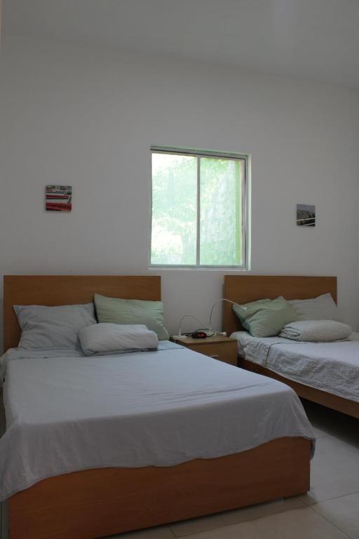 Postel nebo postele na pokoji v ubytování Casa Pé di Polon holiday home