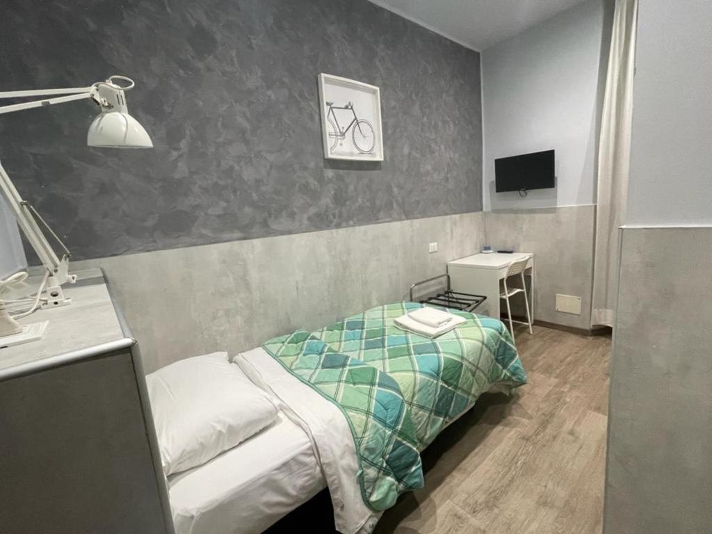 Postel nebo postele na pokoji v ubytování Hotel Convertini