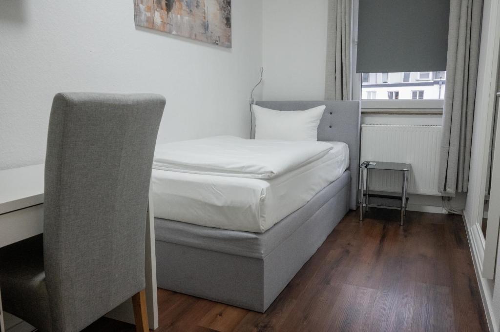 Postel nebo postele na pokoji v ubytování Hotel Teatro