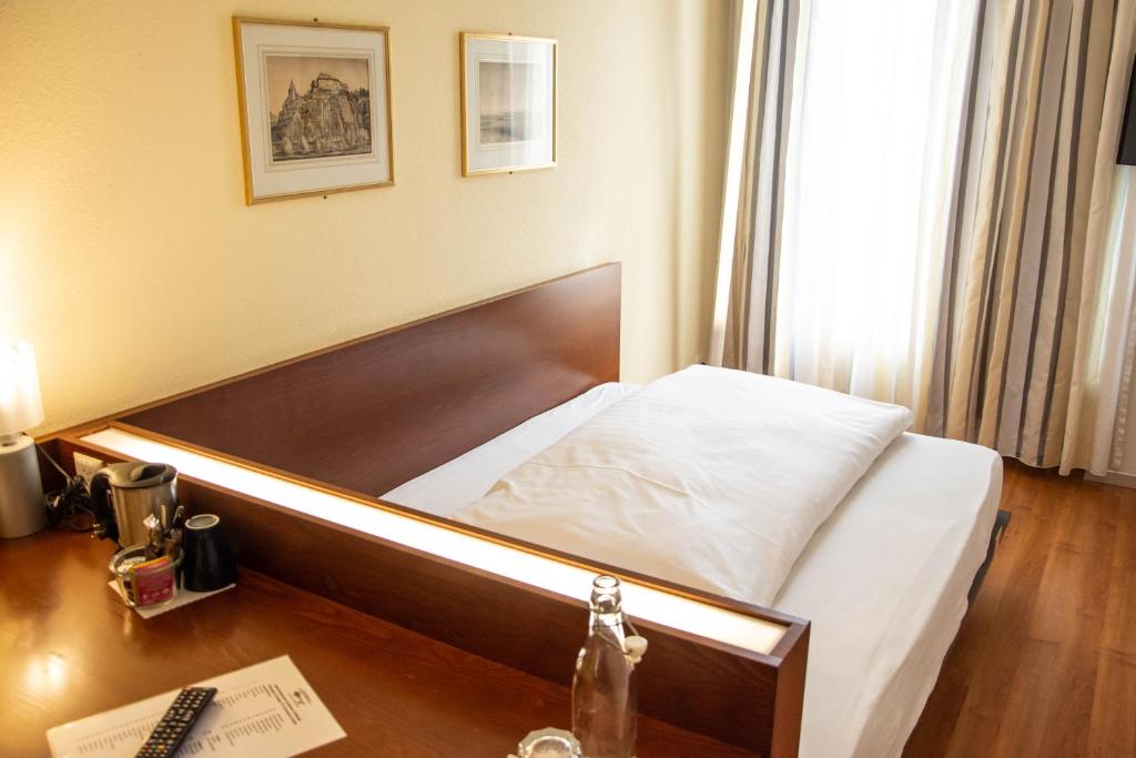 Postel nebo postele na pokoji v ubytování Goldener Schlüssel