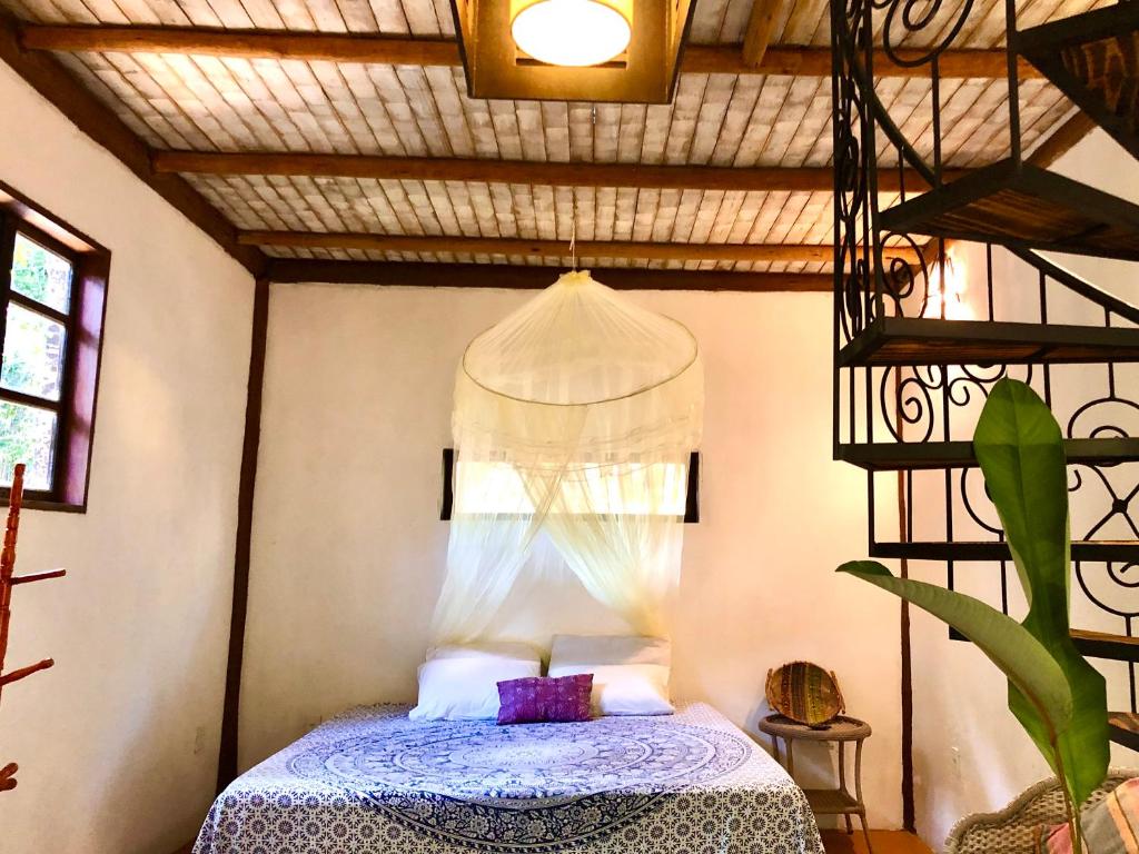 Postel nebo postele na pokoji v ubytování Gaia Eco Glamping - Instituto Almas Livres
