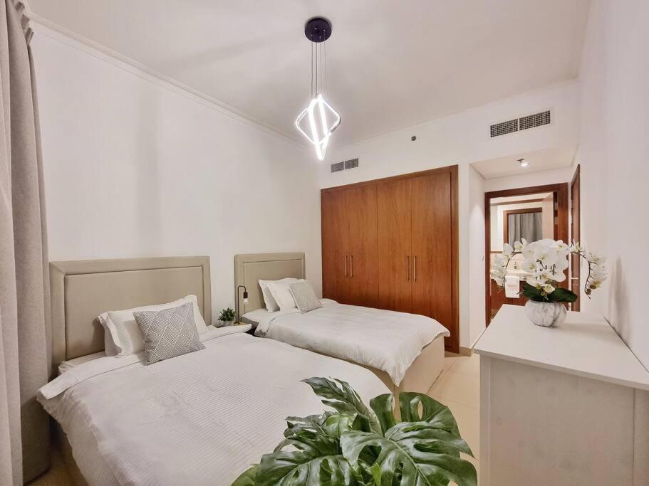 Postel nebo postele na pokoji v ubytování Spectacular Downtown Apartment T1-34