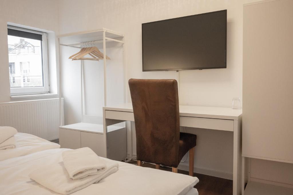 Postel nebo postele na pokoji v ubytování Hotel Teatro