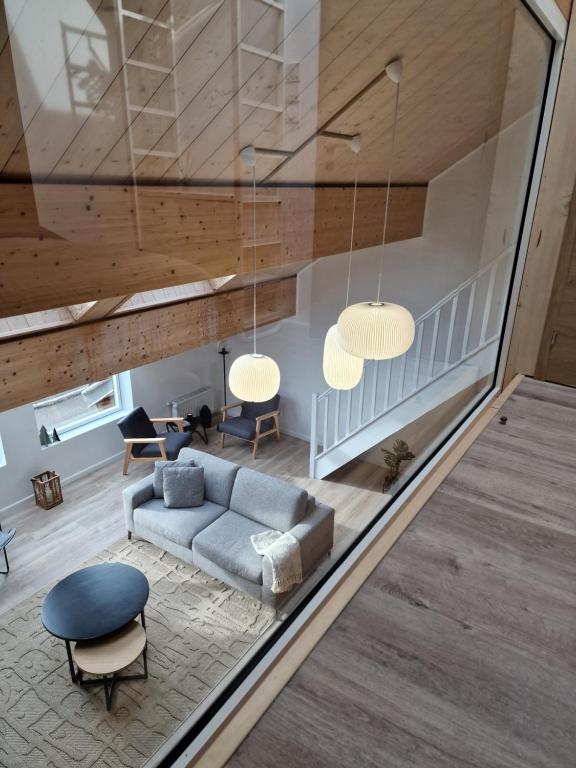 Posezení v ubytování Duplex type chalet dans le Jura