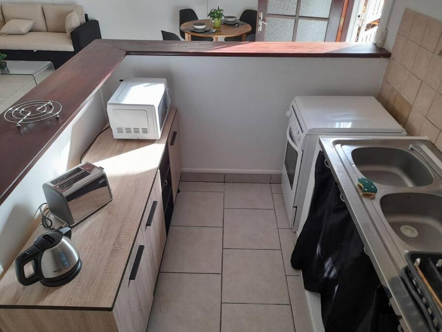 Kuchyň nebo kuchyňský kout v ubytování Appartement Mezzanine
