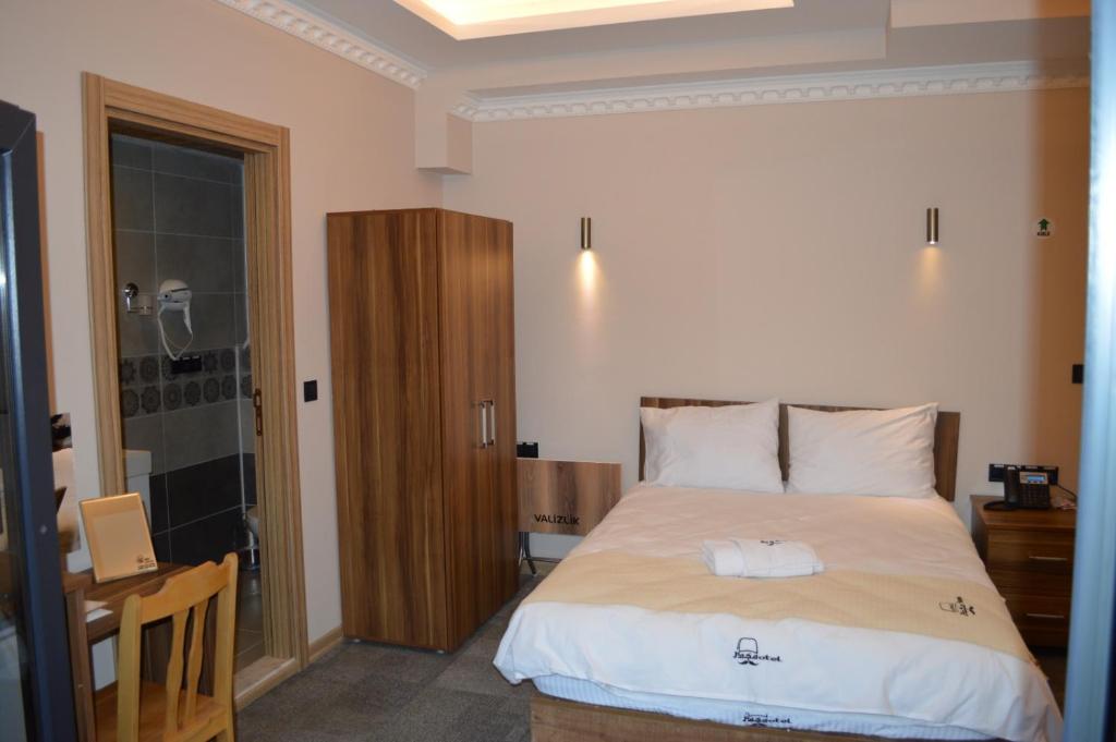 Postel nebo postele na pokoji v ubytování Osmanlı Paşa Otel- Konaklama