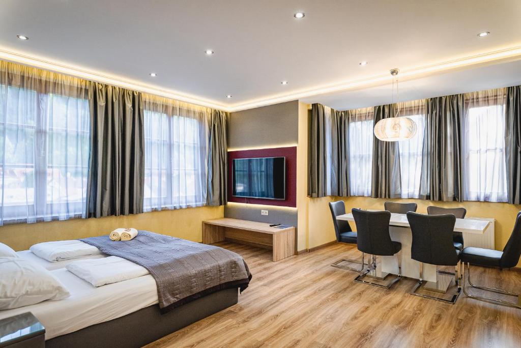 Postel nebo postele na pokoji v ubytování VillaJazz Apartments