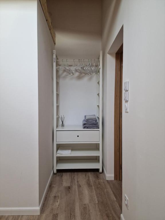 Postel nebo postele na pokoji v ubytování Duplex type chalet dans le Jura