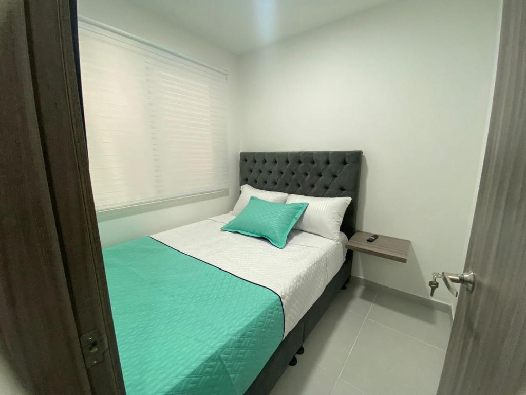Cama o camas de una habitación en Espectacular Apartamento Caney 501