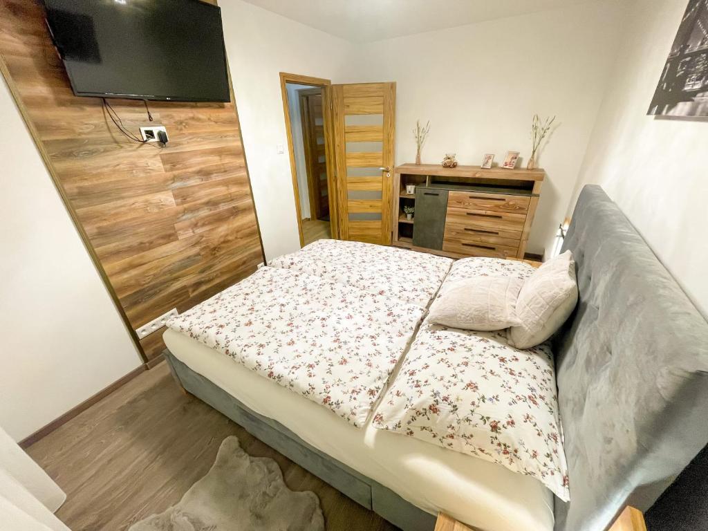 Postel nebo postele na pokoji v ubytování Apartman Anita
