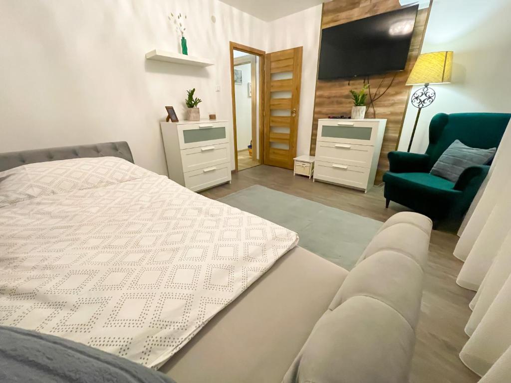 Postel nebo postele na pokoji v ubytování Apartman Anita