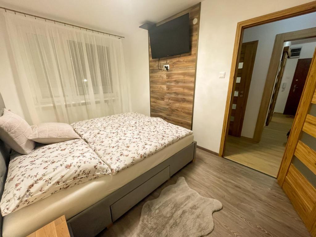 Postel nebo postele na pokoji v ubytování Apartman Anita