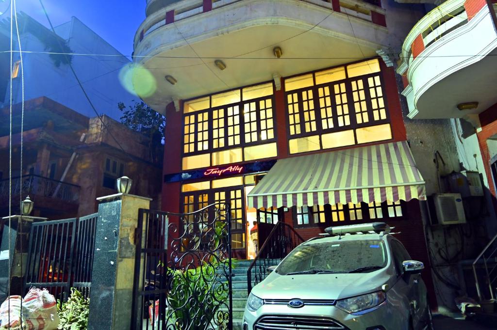a car parked in front of a building at Jay Ally - Boutique Hotel in New Delhi