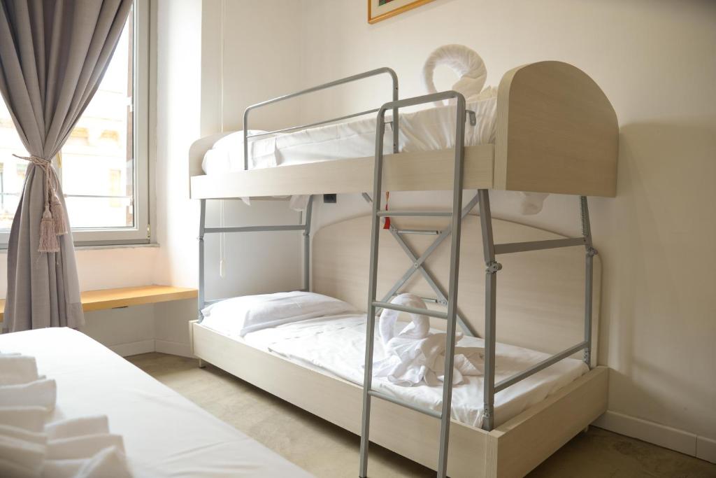 Cama ou camas em um quarto em Romerooms