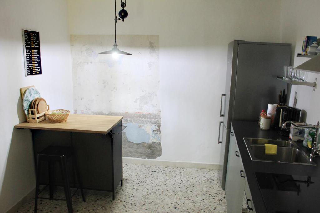 Kuchyň nebo kuchyňský kout v ubytování Cirillo Guesthouse