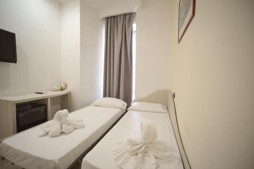 Cama ou camas em um quarto em Romerooms