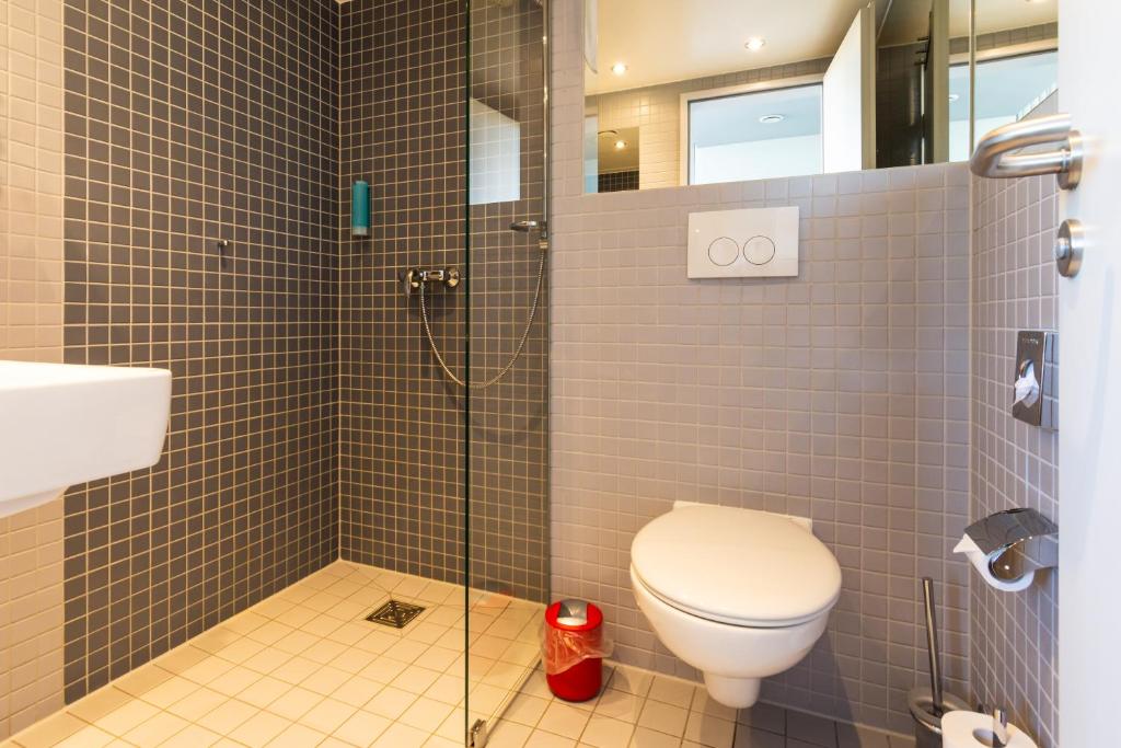Koupelna v ubytování Biendo Hotel