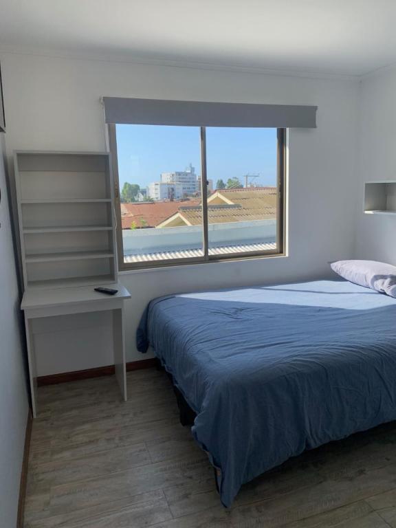 Postel nebo postele na pokoji v ubytování HOSTAL COSTA VIÑA