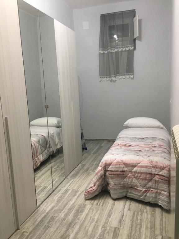 Postel nebo postele na pokoji v ubytování Casa Rosy