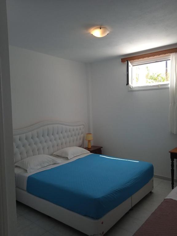 Letto o letti in una camera di Pension Ptolemeos