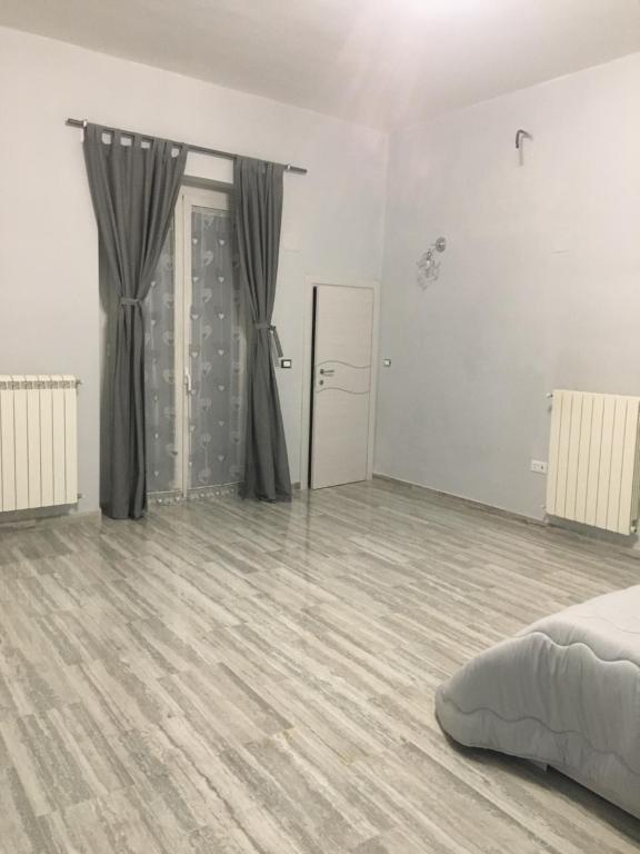 Postel nebo postele na pokoji v ubytování Casa Rosy