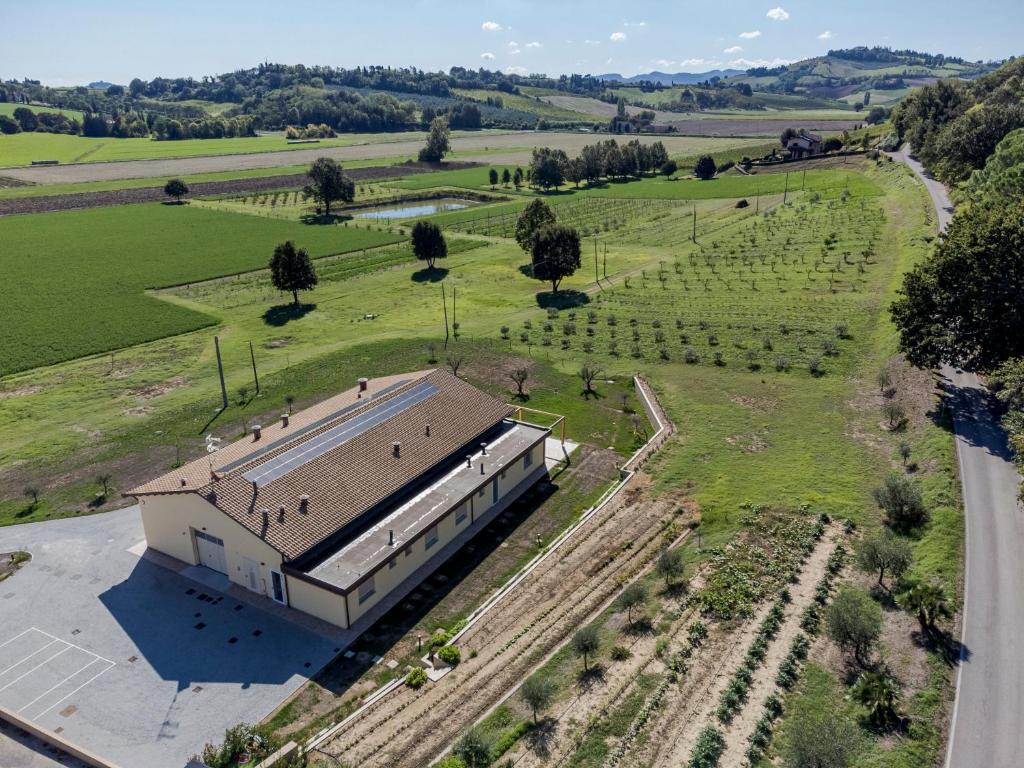 an overhead view of a building in a field at Agrestia azienda agricola in Bertinoro