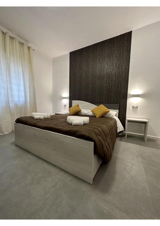 Postel nebo postele na pokoji v ubytování GIROOMS B&B