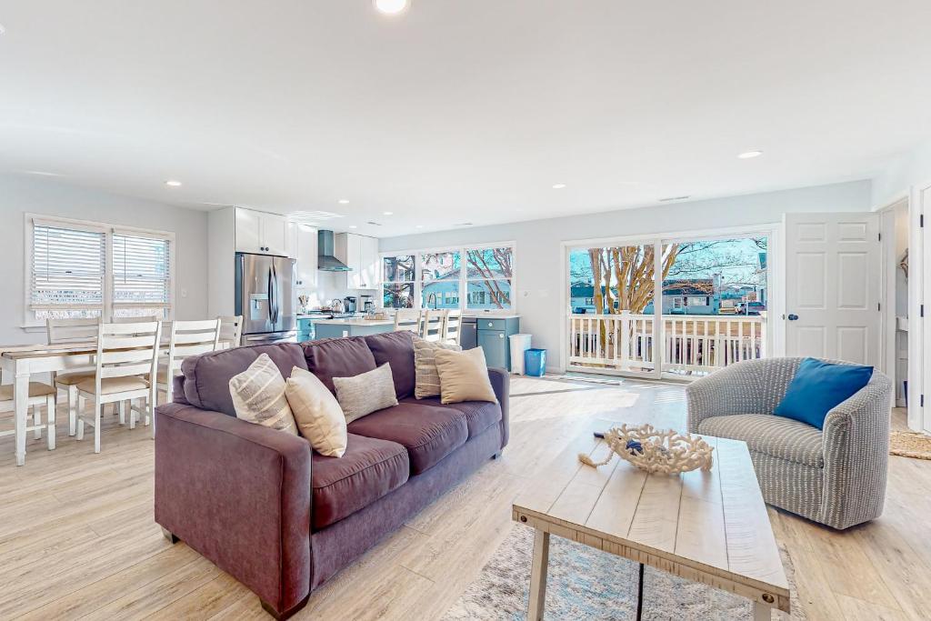 a living room with a couch and a table at Town of South Bethany --- 108 Brandywine Dr in Bethany Beach