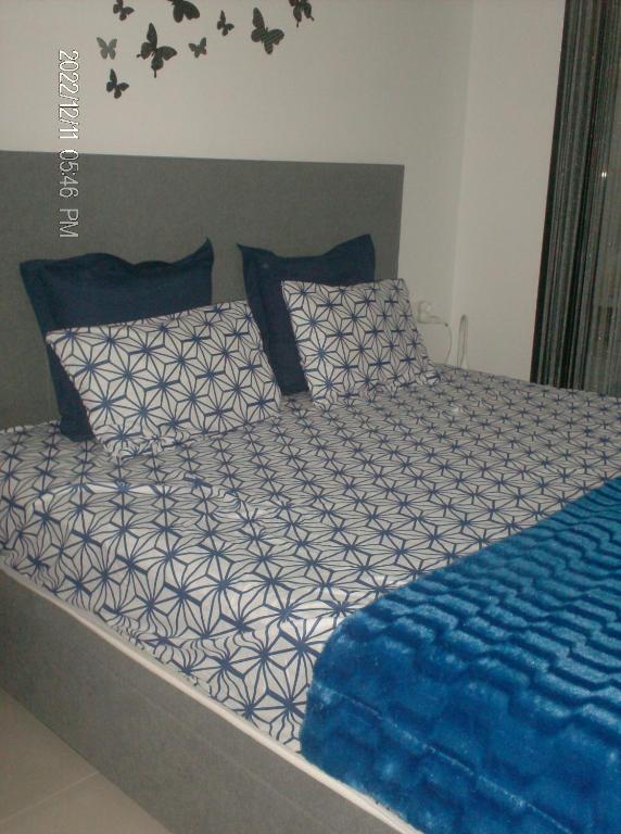 A bed or beds in a room at Senika
