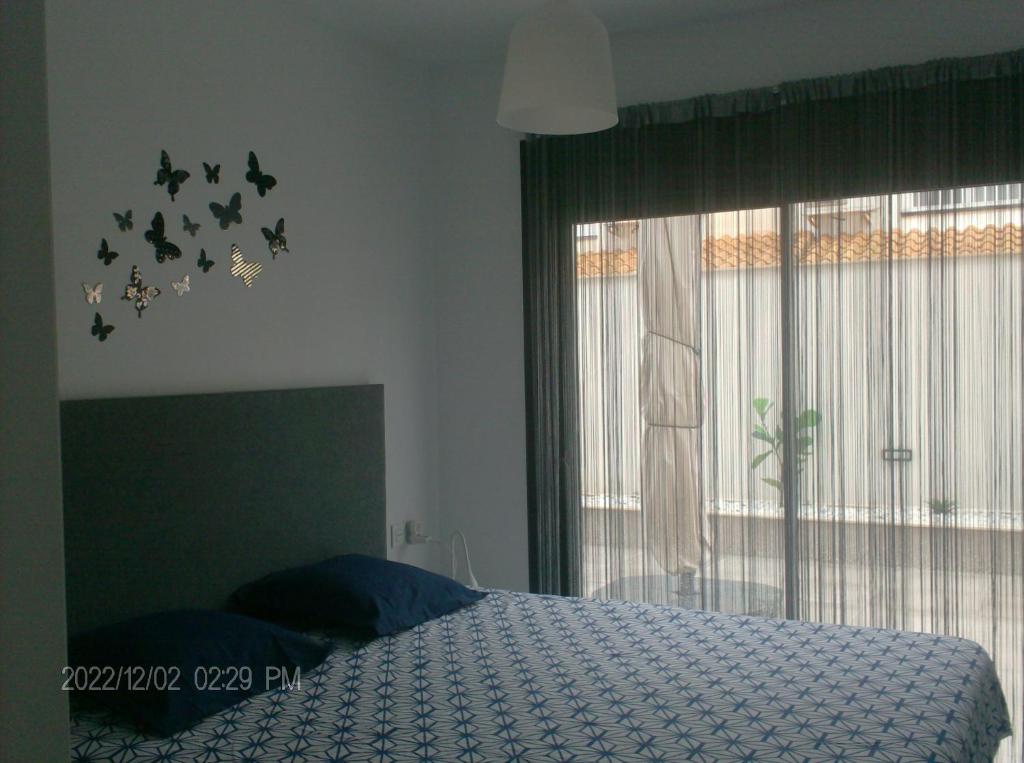 A bed or beds in a room at Senika