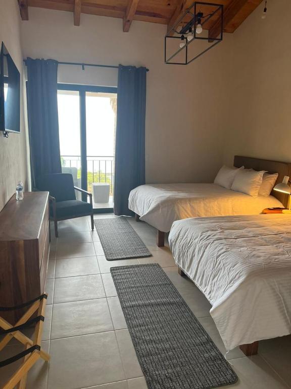 Postel nebo postele na pokoji v ubytování CASA RIVERA DE MORAS