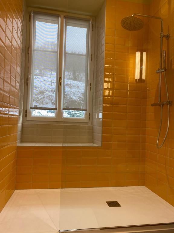 Kúpeľňa v ubytovaní LE CLOS DU TULIPIER