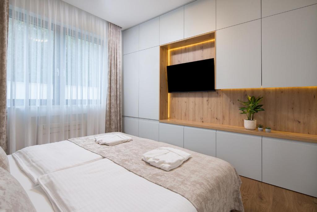 Posteľ alebo postele v izbe v ubytovaní ENA, Luxury Apartments Opatija
