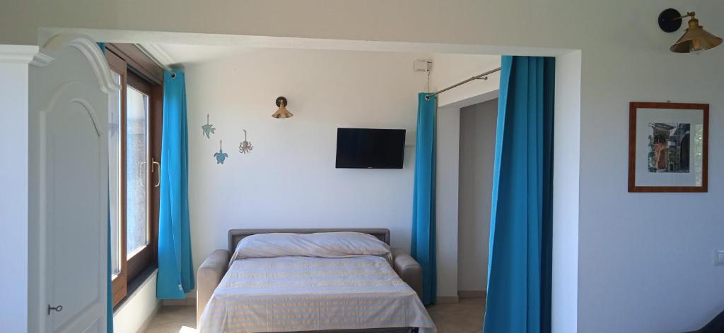 A bed or beds in a room at Case belvedere